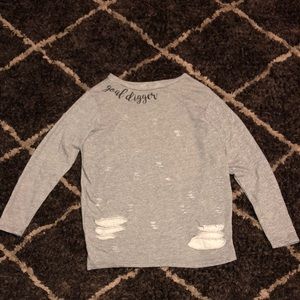Grey slightly distressed sweater